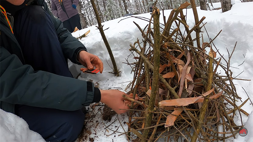 teepee style fire. sticks stacked in a teepee form